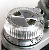 The clear wind knob — the counter stays readable