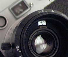 Align the aperture figures, then mount the hood